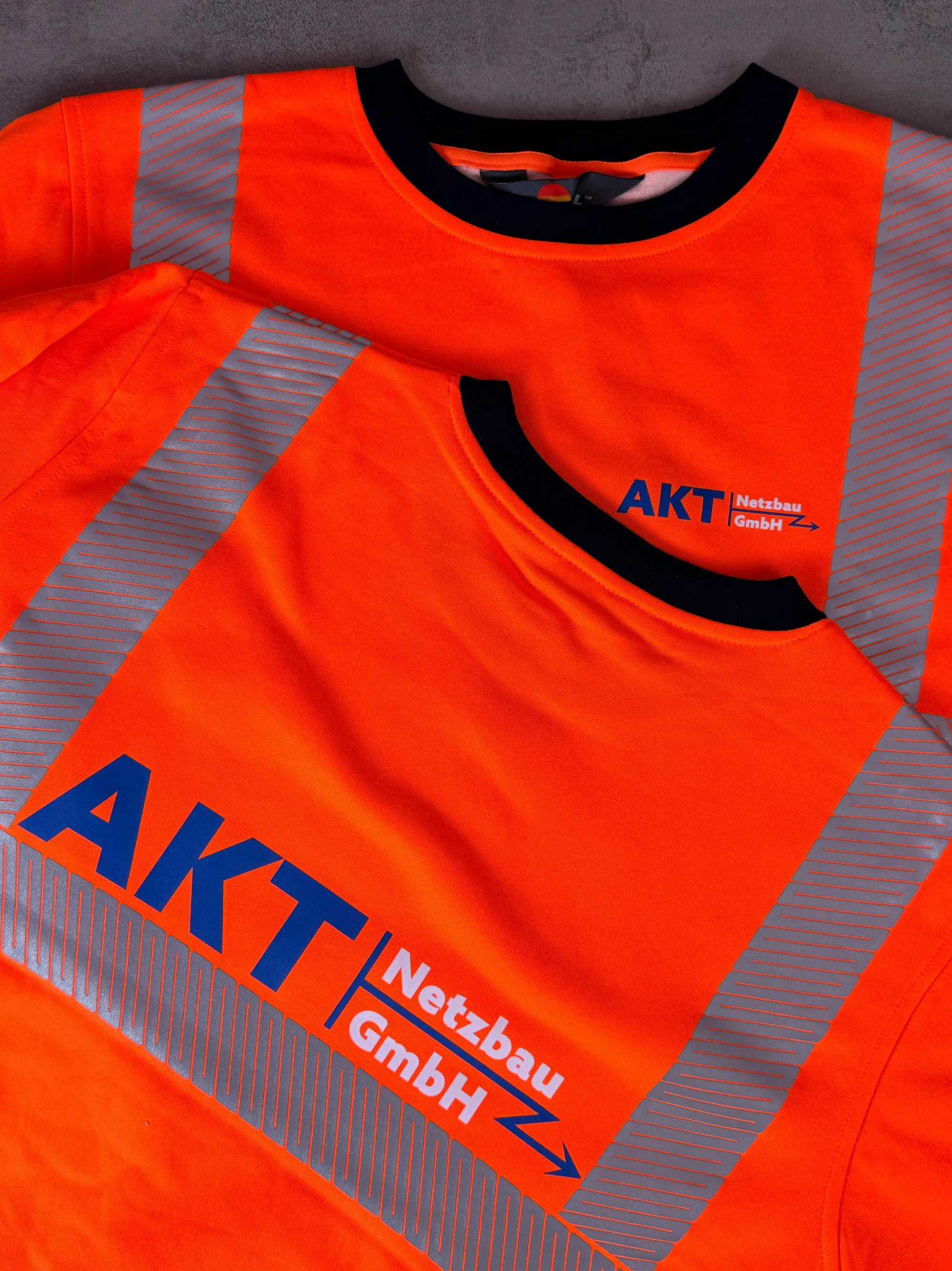 AKT Netzbau Warnweste mit gedrucktem Logo