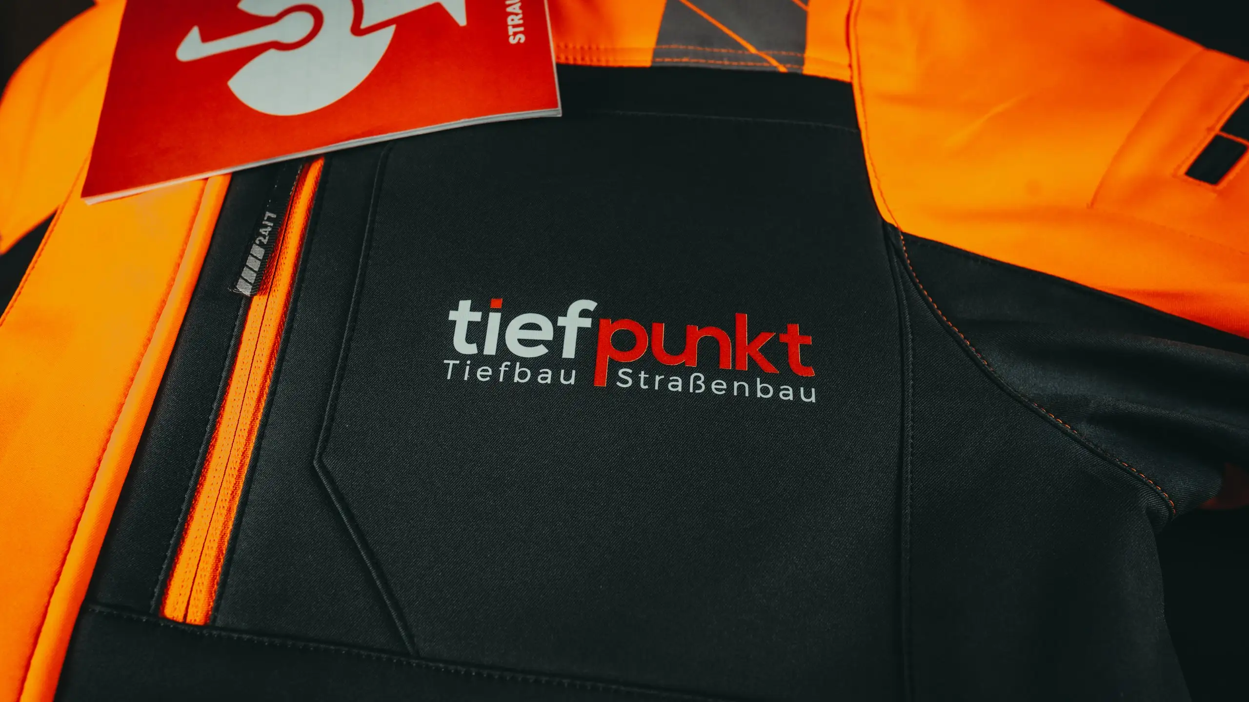 Softshelljacke mit tiefpunkt-Brustlogo